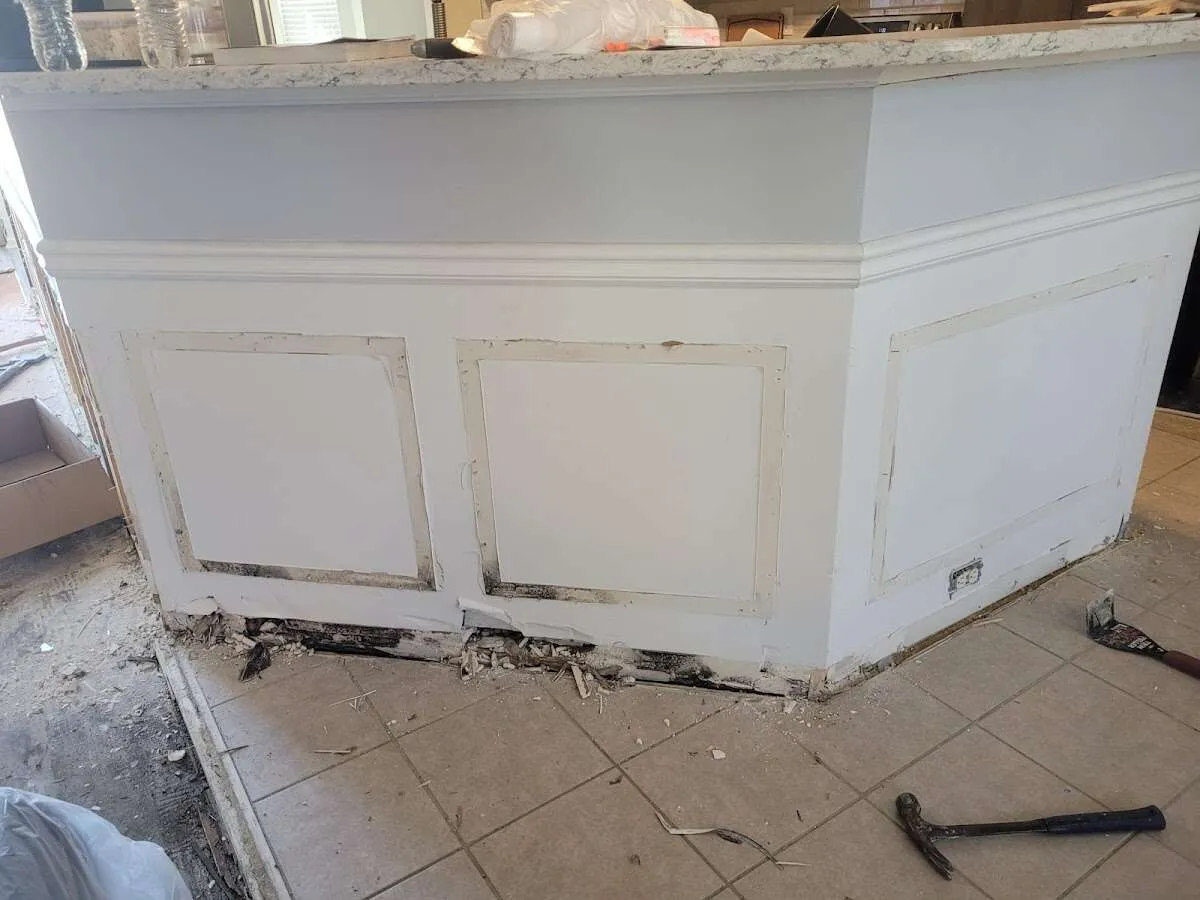 Water damage and mold on kitchen during Storm Damage Restoration in Hollis